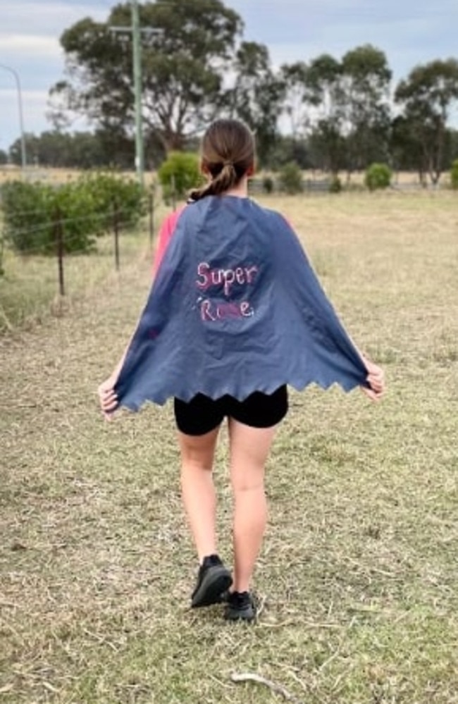 Rose reclaiming her cape after bringing her abuser to justice. Picture: Supplied