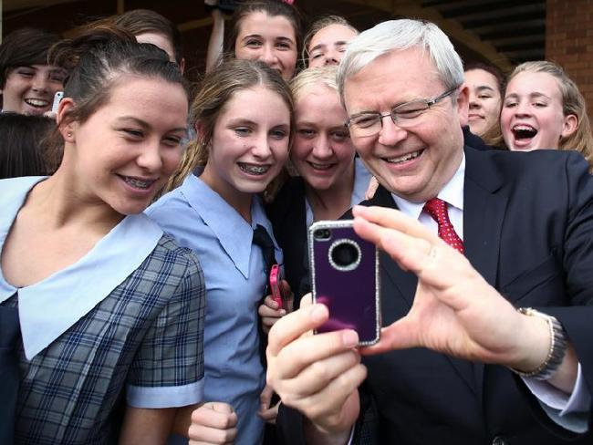 Man of the people … Kevin Rudd poses for selfies with students at St Columan's College in Caboolture ahead of the 2013 federal election. Picture: Andrew Meares