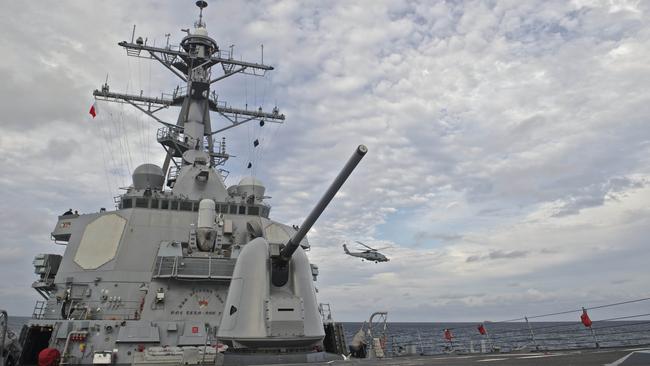 This US Navy photo obtained October 21, 2016 shows An MH-60R Sea Hawk, assigned to Helicopter Maritime Strike Squadron (HSM) 49,as it takes off from the flight deck aboard the guided-missile destroyer USS Decatur (DDG 73) on September 14, 2016 in the Sea of Japan.  A US destroyer sailed close to a string of islands claimed by China in the South China Sea on October 21, 2016, the Pentagon said, amid continued tensions in the contested waterway. The USS Decatur passed close to the Paracel Islands and "conducted this transit in a routine, lawful manner without ship escorts and without incident," Pentagon spokesman Commander Gary Ross said.  / AFP PHOTO / Navy Media Content Operations (N / MC3 Gerald Dudley REYNOLDS / RESTRICTED TO EDITORIAL USE - MANDATORY CREDIT "AFP PHOTO / US NAVY/Specialist 3rd Class Gerald Dudley Reynolds" - NO MARKETING NO ADVERTISING CAMPAIGNS - DISTRIBUTED AS A SERVICE TO CLIENTS