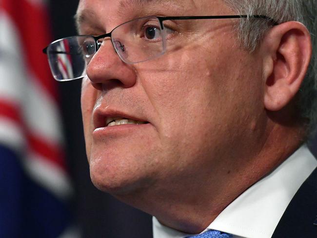 CANBERRA, AUSTRALIA - NOVEMBER 12: Prime Minister Scott Morrison holds a news conference in the Blue Room at Parliament House on November 12, 2020 in Canberra, Australia. Morrison announced the set up of a special prosecutor to deal with any Australian servicemen accused of war crimes in Afghanistan, with the findings of the Brereton Inquiry to be released next week. (Photo by Sam Mooy/Getty Images)