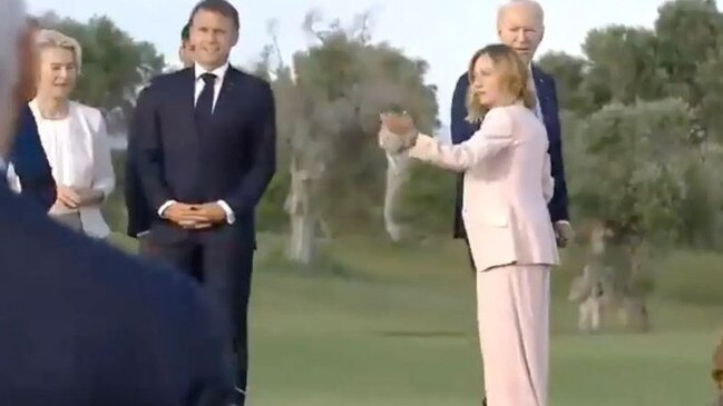 Joe Biden was eventually pulled back by Italian PM Giorgia Meloni.