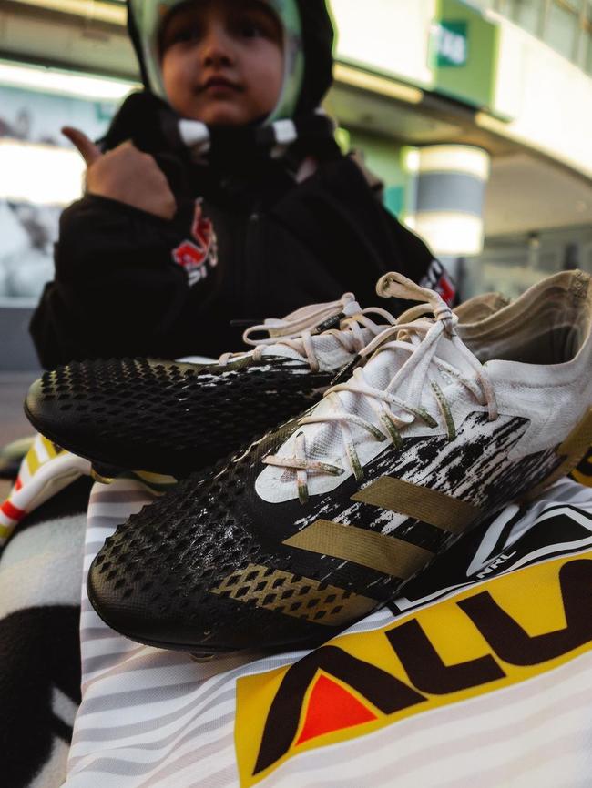 Durakai pictured next to Nathan Cleary’s boots that were gifted to him. Source: Instagram.