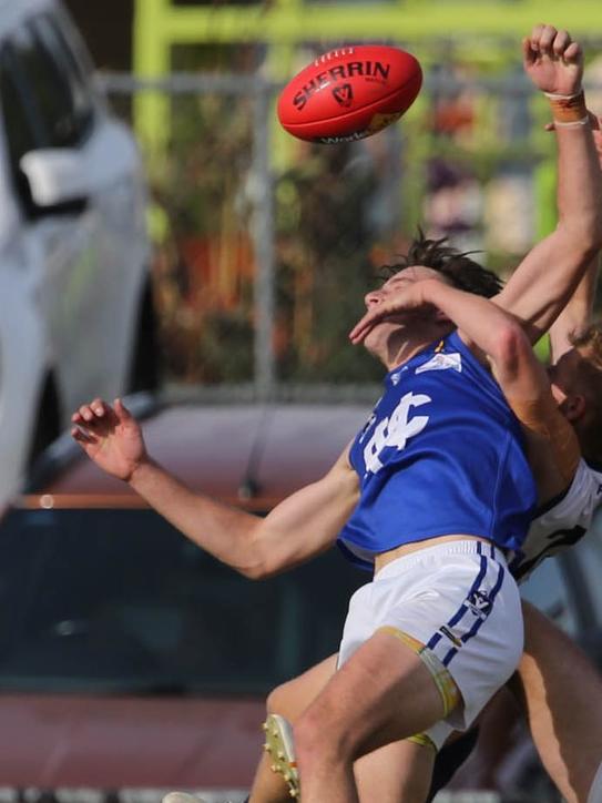 Jack Slocombe flies for a mark. Picture: Doug Farr