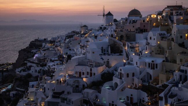 Santorini residents call for cap on tourists visiting island