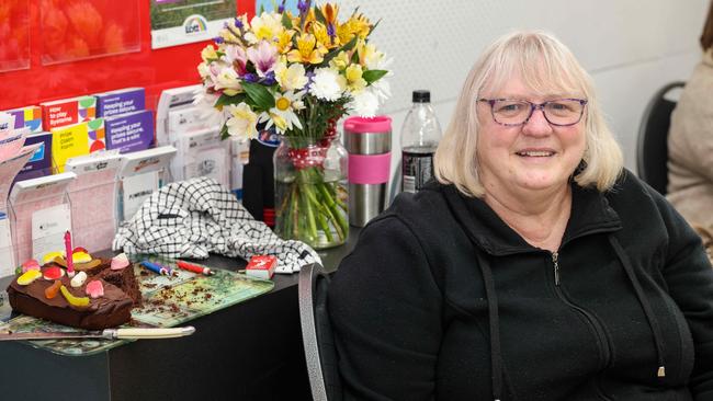 Sharee Cocks, enjoying a piece of cake at the town’s weekly “stitch and bitch” session at Snowtown Newsagency. Picture: Russell Millard