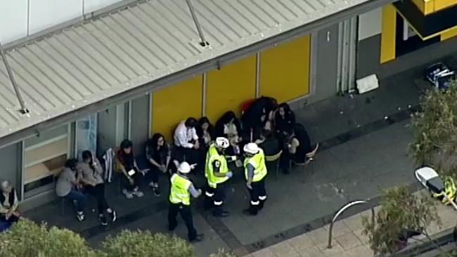 Authorities attend to victims of the bank fire. Picture: Seven News