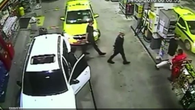 CCTV shows Lochte and teammates at the gas station.