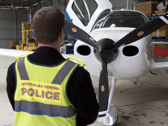 Seized assets included residential houses, funds in bank accounts, luxury cars, boats, motorbikes and an aircraft. Picture: Australian Federal Police