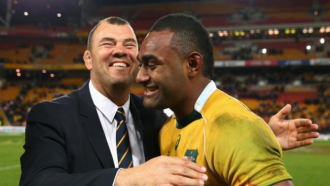 BRISBANE, AUSTRALIA - JULY 18: Wallabies coach Michael Cheika celebrates with Tevita Kuridrani of the Wallabies after winning the Rugby Championship match between the Australian Wallabies and the South Africa Springboks at Suncorp Stadium on July 18, 2015 in Brisbane, Australia. (Photo by Cameron Spencer/Getty Images)