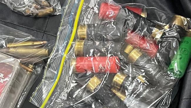 Police seized a handgun, two long arm firearms and ammunition among other items. Picture: Supplied