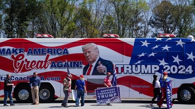 Trump supporters are seen outside a stop on Florida Governor Ron DeSantis' nationwide book tour.