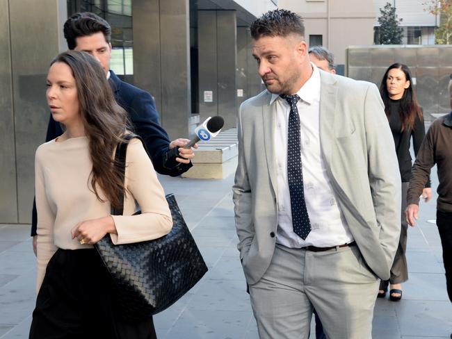 Former St Kilda star Sam Fisher arrives at the County Court for sentencing. Picture: Andrew Henshaw