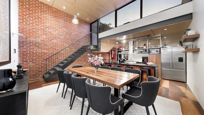 This industrial-feel townhouse spreads across four levels.
