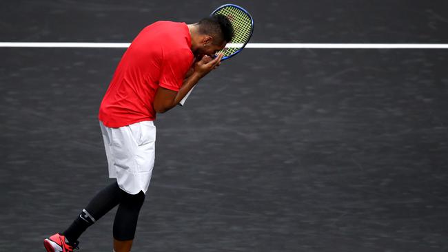 Team World star Nick Kyrgios reacts after losing a point to Roger Federer. Picture: Getty