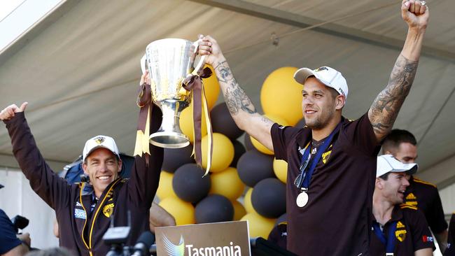 Lance Franklin and Alastair Clarkson hold up the 2013 premiership cup — the 2013 Grand Final was Franklin’s last game for Hawthorn. Picture: Michael Klein