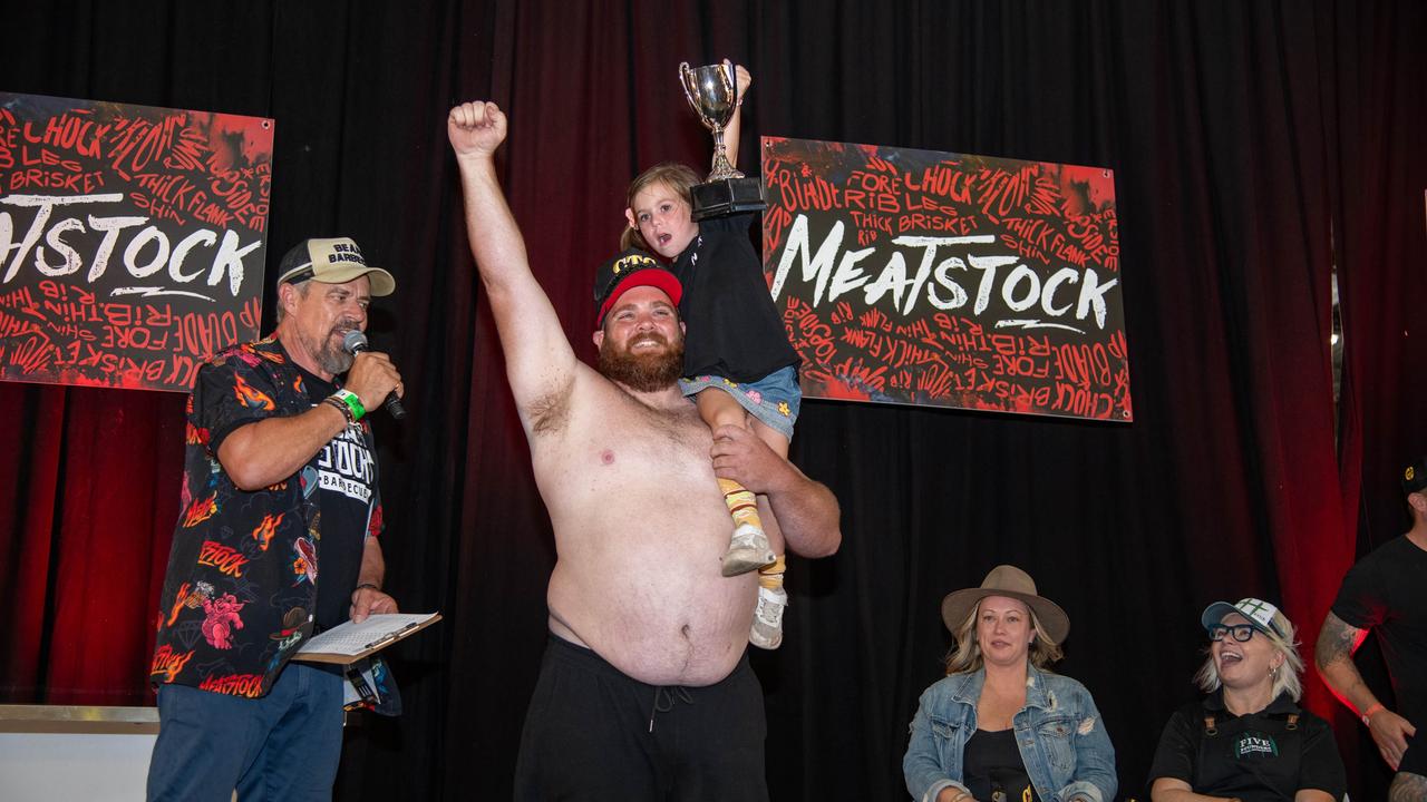 Winner of the Best Dad Body competition, Luke Billin with his daughter Madalin. Meatstock - Music, Barbecue and Camping Festival at Toowoomba Showgrounds.Saturday March 9th, 2024 Picture: Bev Lacey