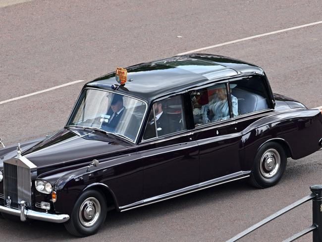 Camilla, Duchess of Cornwall, is seen in the rear of a car as she is driven along the Mall towards Buckingham Palace. Picture: Getty