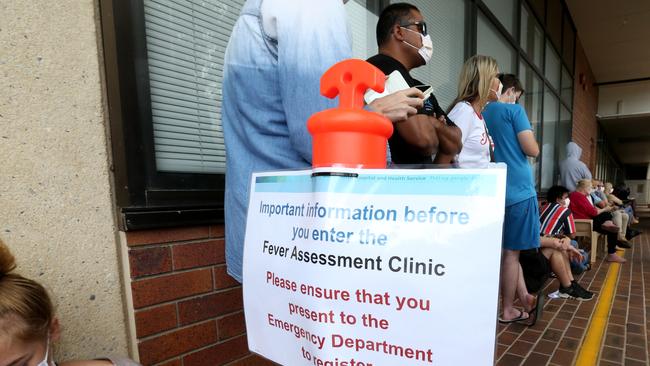 People attend the fever clinic at Redcliffe Hospital. Photo Steve Pohlner