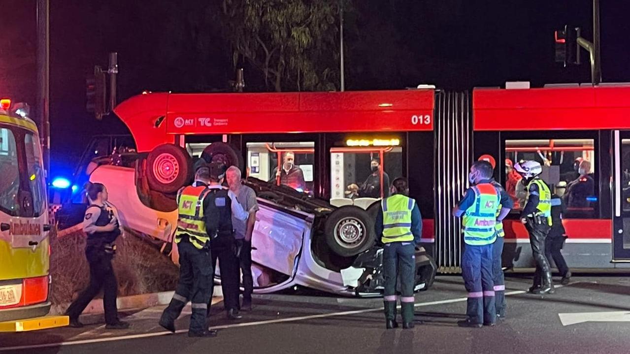 A 50-year-old McKellar man lost his licence and will face court after driving through a red light and colliding with a tram. Picture: Mark Parton