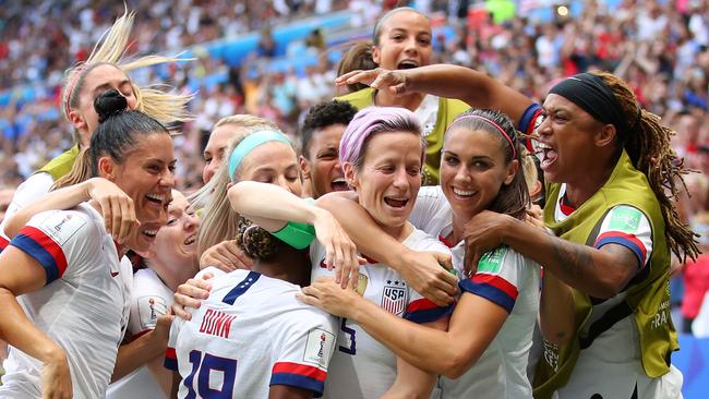 Megan Rapinoe of the USA celebrates with teammates after scoring her team's first goal during the 2019 FIFA Women's World Cup France final between the USA and The Netherlands. Picture: Richard Heathcote/Getty Images