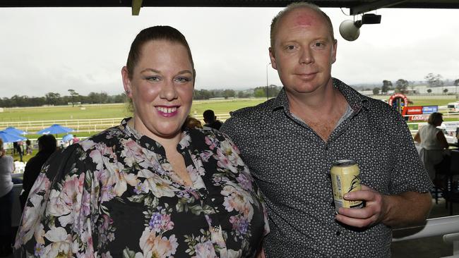 The Ladbrokes 2024 Moe Cup is held at Moe Horse Racing Club, Moe Victoria, Friday 18th October 2024. Racegoers Courtney Whittaker And Daniel Strahan enjoying the races.Picture: Andrew Batsch