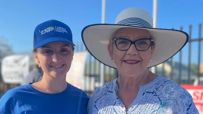 Bundaberg election volunteers Mia Geddes and Judy Peters outside the Bundaberg South State School booth.