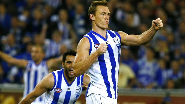 Drew Petrie in Frank the Tank mode after his matchwinning goal against Essendon in the 2014 elimination final.