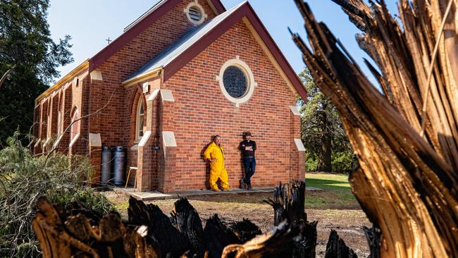 The fire came close to Cudgewa’s Holy Trinity church — but didn’t touch the house of worship. Picture: Simon Dallinger