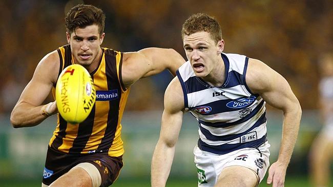 Stratton hunts down Geelong captain Joel Selwood. Picture: Michael Klein