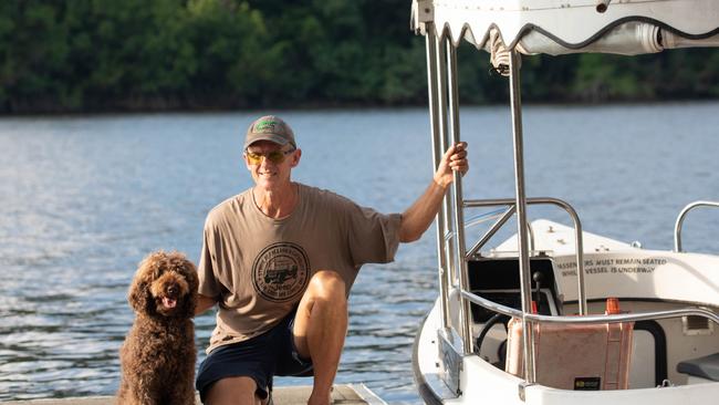 Daintree River wildlife expert David White, of Solar Whisper Crocodile and Wildlife Cruises, with his trusty dog Dougie. PHOTO: Mark Murray