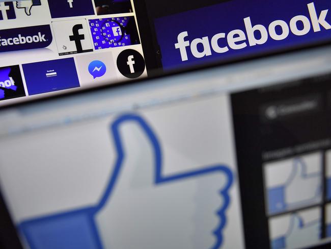 (FILES) This file photo taken on November 20, 2017 shows logos of US online social media and social networking service Facebook. Facebook said on March 20, 2018 it is 'outraged' by misuse of data by Cambridge Analytica, the British firm at the centre of a major data scandal rocking Facebook, who suspended its chief executive as lawmakers demanded answers from the social media giant over the breach. / AFP PHOTO / LOIC VENANCE