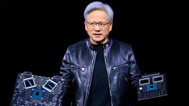 NVIDIA's CEO Jensen Huang displays products onstage during the annual Nvidia GTC Artificial Intelligence Conference in San Jose, California. Picture: Josh Edelson/AFP