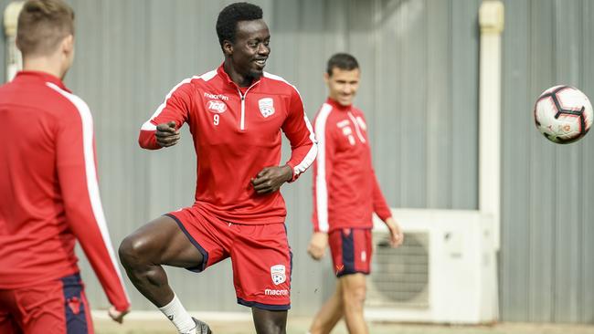 Adelaide United striker Baba Diawara could provide the Reds with some X-factor against Perth Glory on Friday night. Picture: AAP