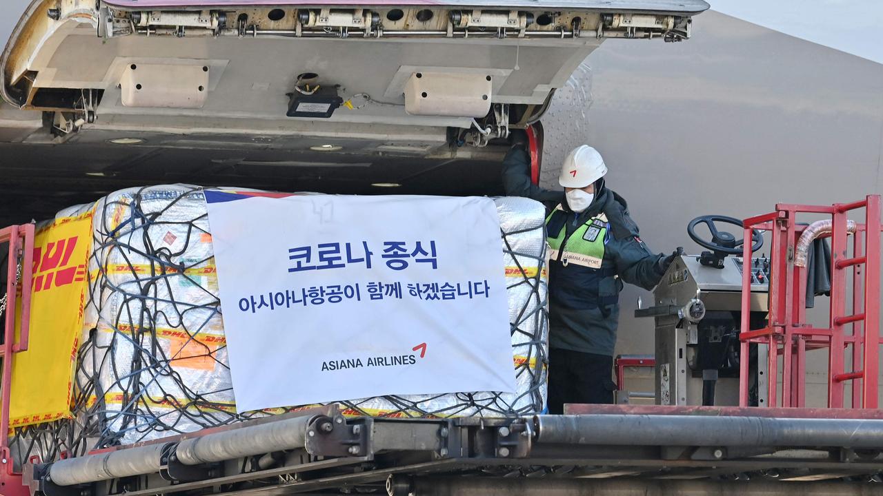 A South Korean worker unloads cargo containing Pfizer's antiviral Covid-19 pill, Paxlovid, at a cargo terminal of the Incheon International Airport. Picture: Jung Yeon-Je/Pool/AFP