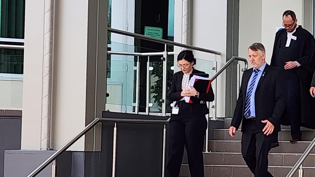 Crown prosecutor Joshua Phillips leaving Rockhampton Courthouse with Detective Acting Senior Sergeant Neil Thompson. Picture: Aden Stokes