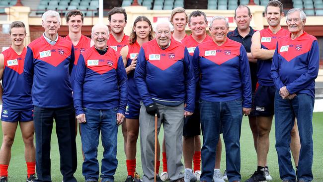 John Leedham, front centre, with past and present North Hobart players as they celebrated the return to the club’s original jumper design. in 2018. Picture: SAM ROSEWARNE