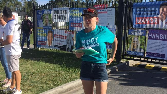 A Mindy Russell supporter with a folder containing how to vote cards which were to be given to the Returning Officer for display outside booths.