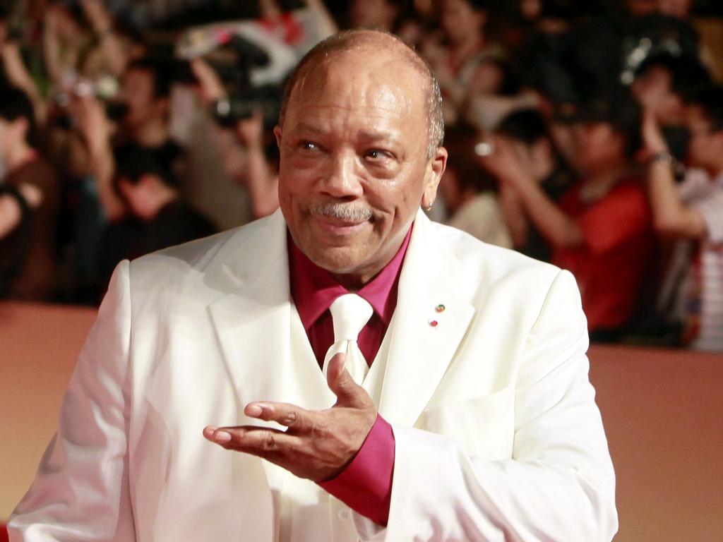 Multi-Grammy winning musician Quincy Jones gestures on the red carpet prior to the closing ceremony of the 12th Shanghai International Film Festival in 2009.