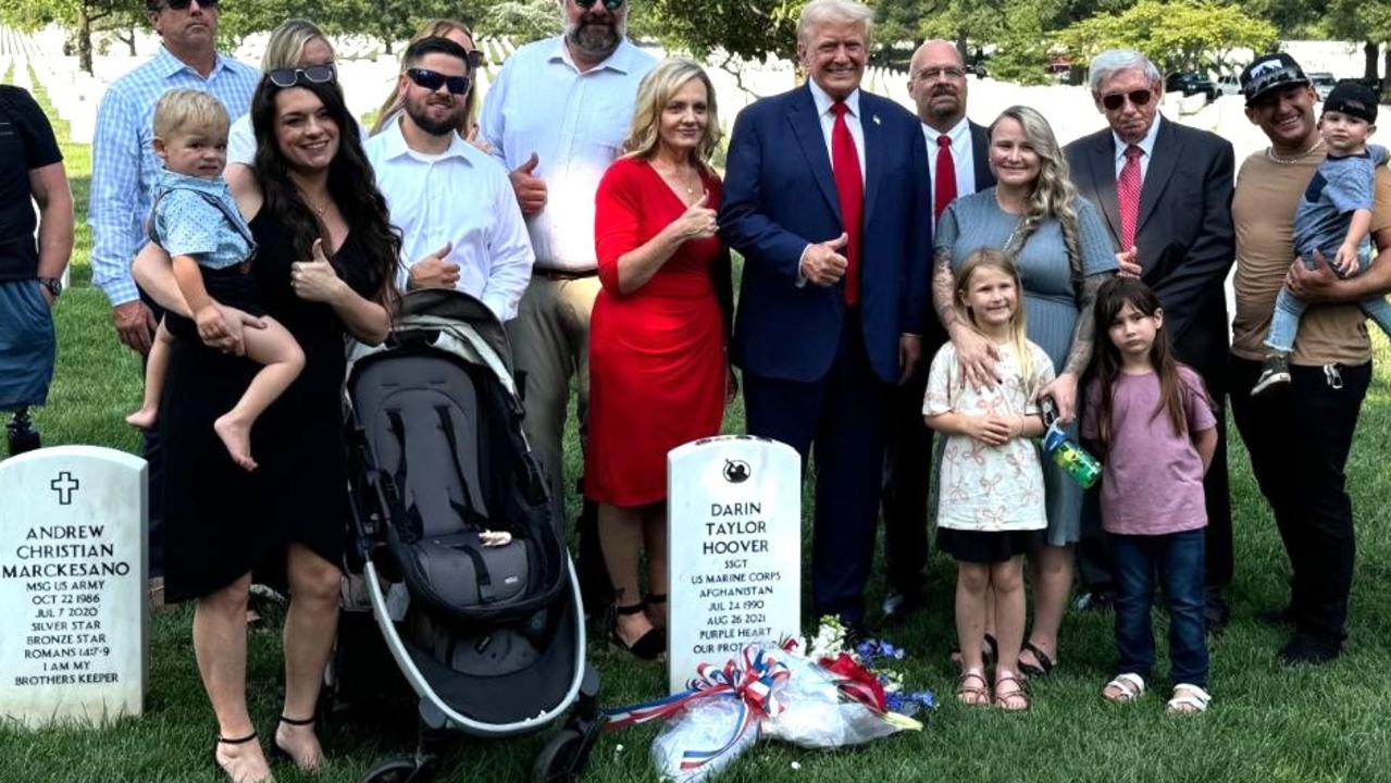 Mr Trump has been criticised for posing with families next to their relatives’ gravestones – in this case, while smiling and flashing the thumbs up sign.