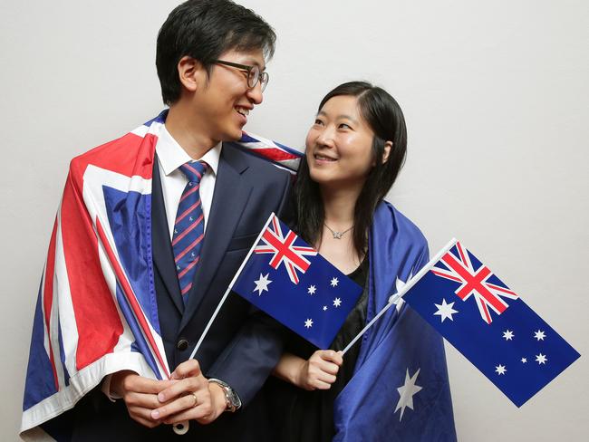 New citizens Simon Lee and Julie Shim from South Korea received their citizenship as part of the Australia Day proceedings at North Ryde in 2016. Picture: Adam Ward