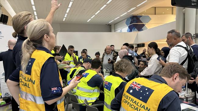 Australian Government officials assisting Australians to depart Lebanon on two government-supported charter flights from Beirut Airport to Larnaca, Cyprus. Picture: DFAT