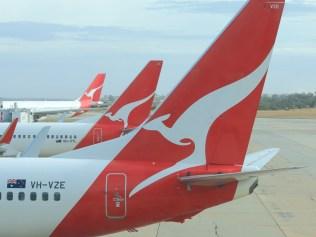 Melbourne Australia- March 14, 2014: Qantas airplanes wait for departure at Melbourne Airport