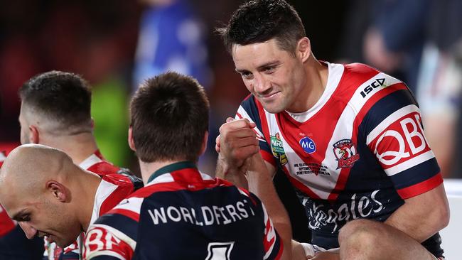 Cooper Cronk of the Roosters celebrates with Luke Keary of the Roosters after victory in the 2018 NRL Grand Final match between the Melbourne Storm and the Sydney Roosters. Photo: Getty Images