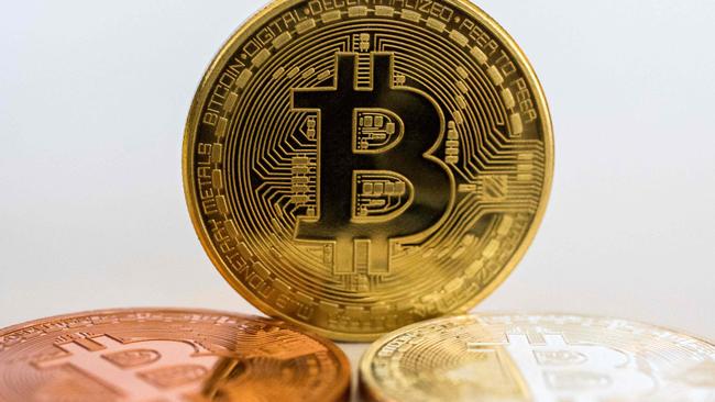 A visual representation of the digital cryptocurrency Bitcoin. (Photo by JACK GUEZ / AFP)