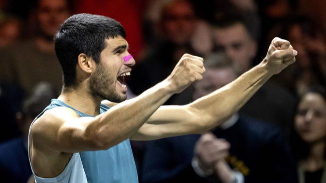 Spain's Carlos Alcaraz celebrates after winning match point. Photo by Sander Koning, AFP.