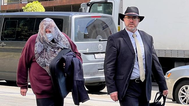 Gaye Grant walking into Wollongong Courthouse on Tuesday with her lawyer, Patrick Schmidt. Picture: Dylan Arvela