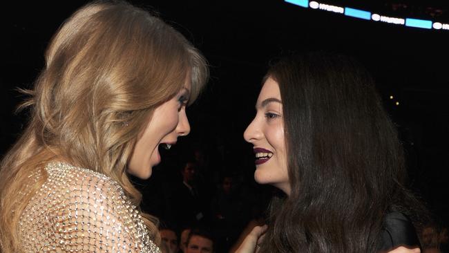 Swift embracing Lorde at the Grammys in 2014. Picture: Kevin Mazur/WireImage