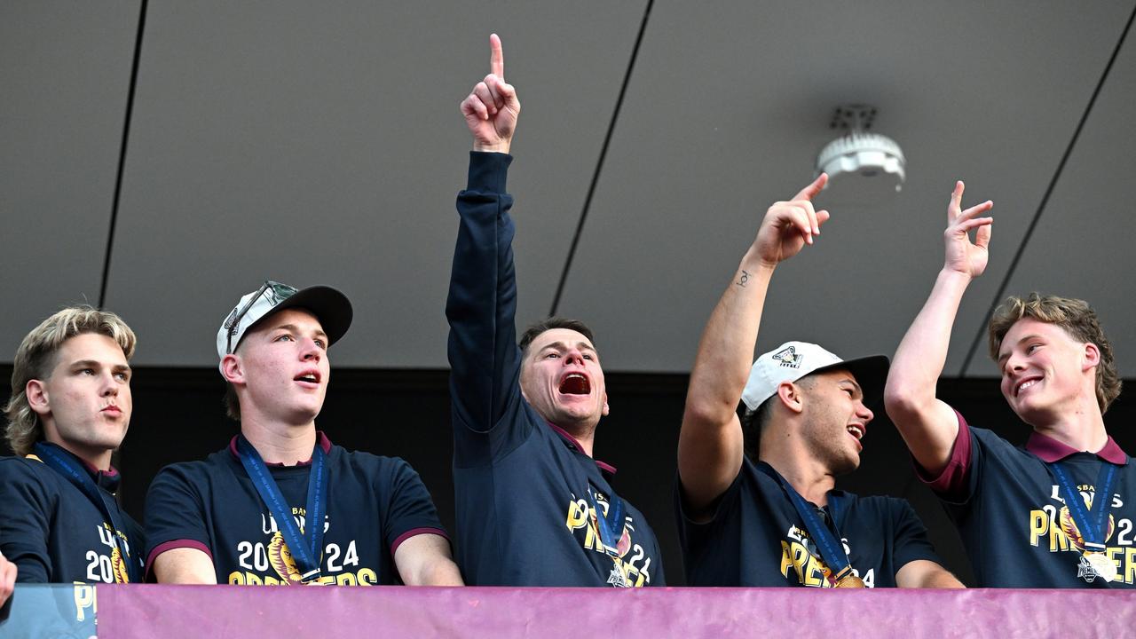 IPSWICH, AUSTRALIA - SEPTEMBER 29: Brisbane Lions AFL players celebrate with fans at Brighton Homes Arena, on September 29, 2024, in Ipswich, Australia. The Brisbane Lions won the 2024 AFL Grand Final yesterday beating Sydney Swans at the MCG. (Photo by Bradley Kanaris/Getty Images)