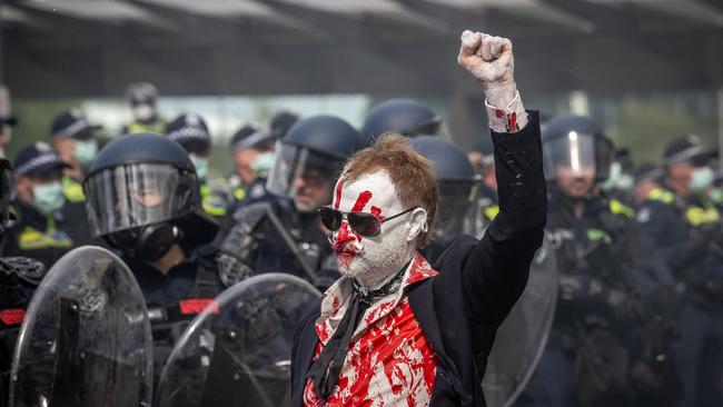 Anti-war activists protest the Land Forces 2024 International Land Defence Exposition at the Melbourne Convention and Exhibition Centre. Picture: Jake Nowakowski