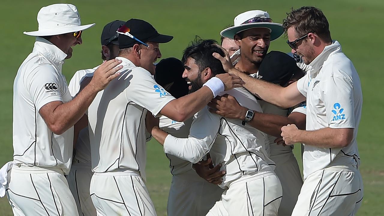 New Zealand celebrate their stunning win after taking the final 7 wickets for 41 runs.